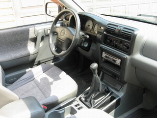 Illustration for article titled For $4,650, This 2002 Isuzu Rodeo Will Flip Its Lid, And That’s No Lie